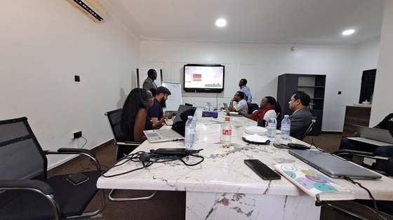 AIC, UNDP, MoFPED and IRA representatives reviewing the mission's findings together.