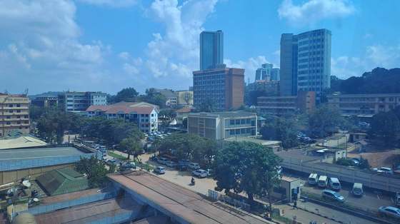 Kampala's skyline, seen from a rooftop on the mission's first morning in the city.