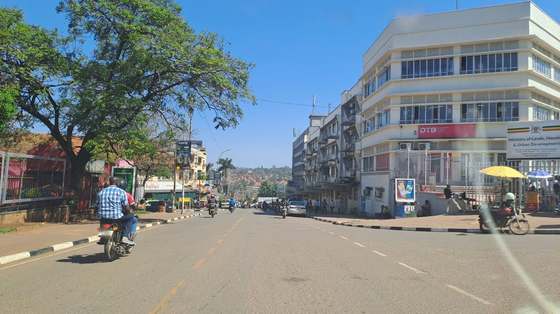 A street corner near the city centre, on the way to a meeting.